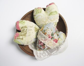 Set of 3 fabric heart bowl fillers made from an old patchwork quilt accented with cotton lace trim. Country farmhouse decor. Handmade