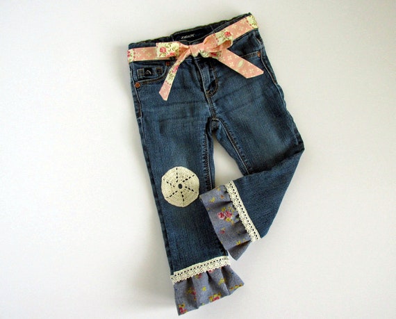 blue jeans with ruffles on the bottom