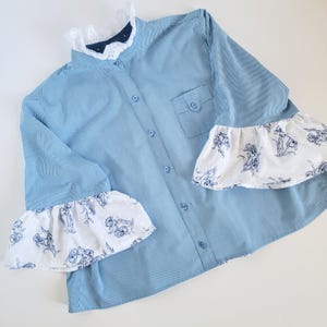 XLG cropped top with 3/4 length sleeves made from an upcycled woman's shirt. Accented with gathered eyelet lace.