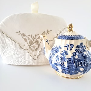 Traditional off white tea cozy for teapot accented vintage cutwork linen. Keeps tea warm while serving. Great tea lover gift. Handmade.