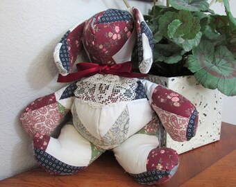 14" Stuffed patchwork rabbit made from a vintage quilt piece with a lace ruffle and bow at the neck. Country farmhouse shelf sitter Handmade