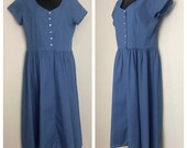 1970s 1980s blue button up scoop neck denim prairie polyester cotton short sleeves flared full skirt large western country house midi dress