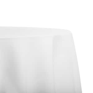 May include: A white round tablecloth with a smooth, wrinkle-free surface. The tablecloth is draped over a table and hangs down the sides.