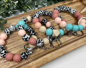 Silicone Beaded Wristlet | Coastal Cowgirl Cow Print | Stretchy Elastic Boho Keychain Bracelet | Swivel Lobster Claw Clasp | Gift for her