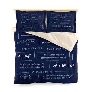 May include: A navy blue duvet cover with white mathematical formulas and equations printed on it. The formulas include the quadratic formula, the slope-intercept form of a linear equation, the Pythagorean theorem, and the formula for compound interest. The duvet cover is made of a soft, comfortable fabric and is perfect for anyone who loves math.