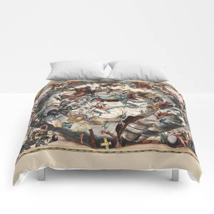 May include: A duvet cover featuring a vintage map design with a beige border. The map is filled with illustrations of figures, constellations, and symbols in shades of brown, blue, and red. Two white pillows are on top.