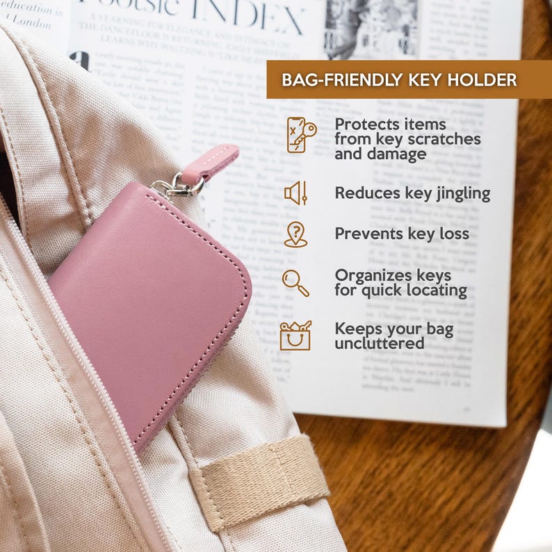 Compact leather key holder inside bag, protects items from scratches and reduces key jingling, organized key case