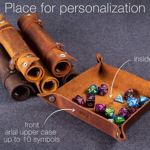 May include: A set of brown leather dice trays and rolling cases. The trays have a personalized name "MIKE" and the cases have a space for up to 10 symbols. The image shows a variety of symbols that can be used for personalization.