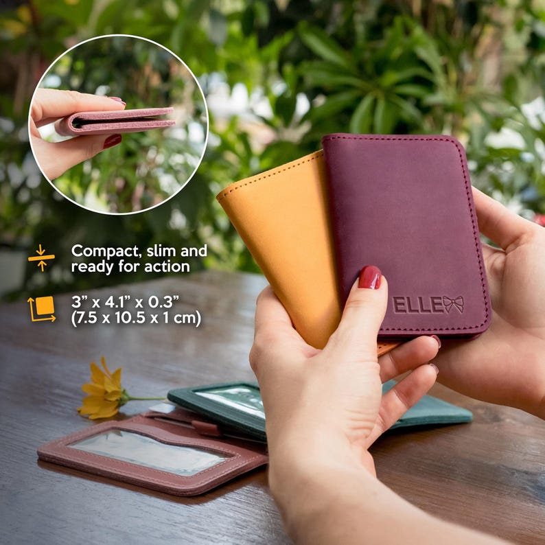May include: Three leather card holders in different colors: burgundy, yellow, and pink. The burgundy card holder has the word "ELLE" embossed on it. The card holders are compact and slim, measuring 3 inches by 4.1 inches by 0.3 inches.