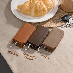 Brown leather key pouch in whiskey, chocolate brown and pecan, minimalist zipper key holder for everyday carry