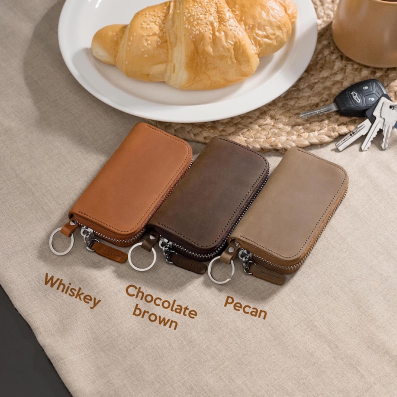 Brown leather key pouch in whiskey, chocolate brown and pecan, minimalist zipper key holder for everyday carry