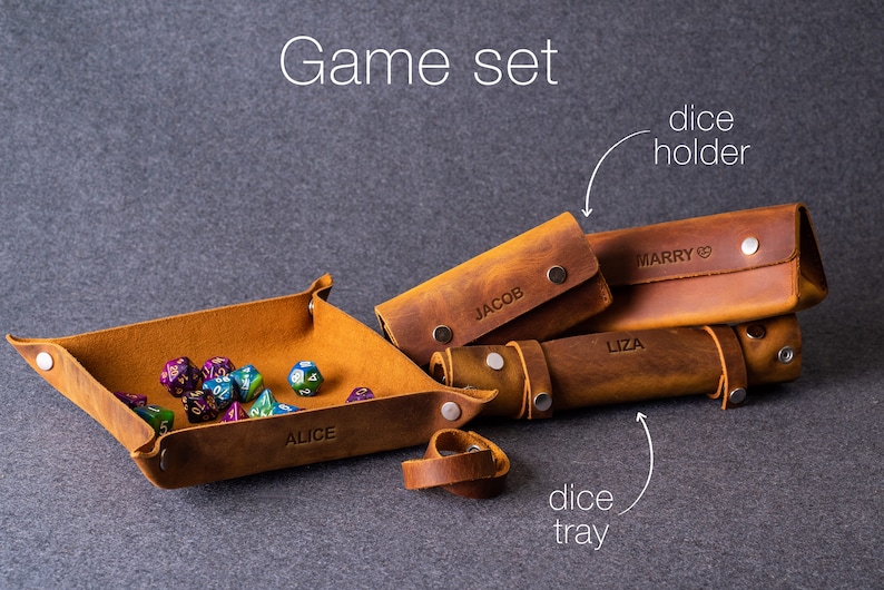May include: A brown leather game set with a dice tray, dice holder, and a ring. The tray is labeled "Alice", the holder is labeled "Marry", and the ring is labeled "Jacob".