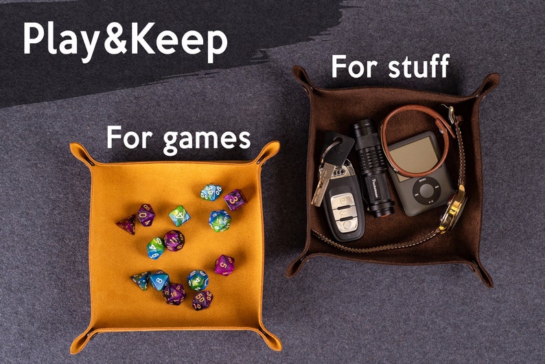 May include: Two leather trays, one brown and one yellow, with the text "Play & Keep" above. The brown tray contains a flashlight, keys, a watch, a music player, and a brown leather bracelet. The yellow tray contains a collection of colorful dice. The text "For games" is above the yellow tray and "For stuff" is above the brown tray.