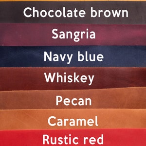 May include: A leather swatch color chart with 10 different colors, including emerald green, tan, chocolate brown, sangria, navy blue, whiskey, pecan, caramel, rustic red, and black.