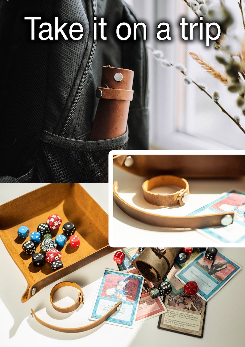 May include: A brown leather dice tray with a rolled up leather dice bag and a set of dice. The tray has a snap closure and a leather strap. The dice bag has a snap closure and a leather strap. The dice are a variety of colors and sizes. The dice tray and bag are on a white surface with a few playing cards.
