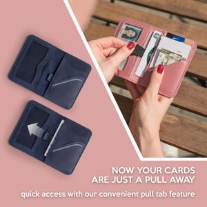 May include: Two blue leather wallets with a pull tab feature for easy access to cards. The wallet on the right is open, showing a pink interior with cards and cash.