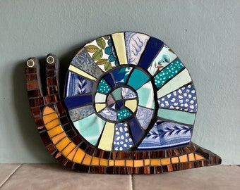 Mosaic Snail in Retro China Art for the Home or Garden. Blues and Mustard Garden Snail.