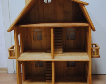 plain wooden dollhouse
