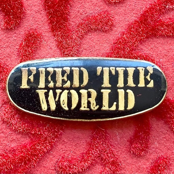 FEED THE WORLD pin / vintage pin enamel pin lapel pin jacket pin pinback button stocking stuffer funny gift present hat tac 80s