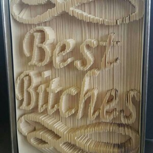 Best Bitches swirly cut and fold book folding pattern