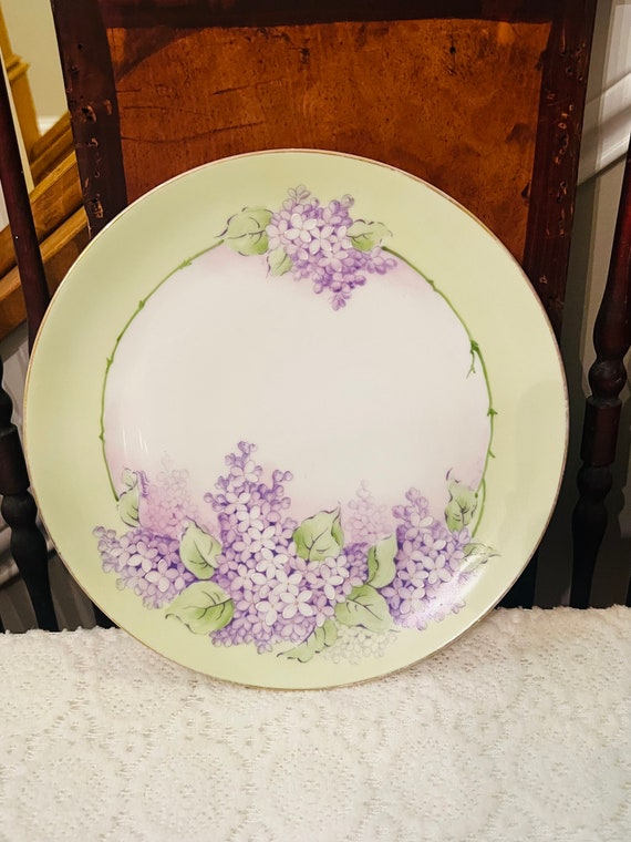 Decorative Ceramic Plates Hand Painted Dot Pattern With Acrylic Paints On A Gray