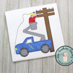 May include: Blue truck with a lift and a worker in a bucket truck working on a power line. The truck has a lightning bolt graphic on the side. The worker is wearing a yellow hard hat and a red shirt. The power line is brown and has a gray pole. The image is on a white background.