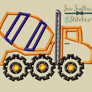 May include: Orange and blue embroidered design of a cement mixer truck with black wheels and yellow centers. The truck has a gear design on the wheels.