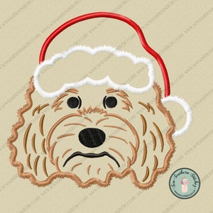 May include: Embroidered design of a dog wearing a Santa hat. The dog has brown fur, a black nose, and brown eyes. The Santa hat is red with white trim.