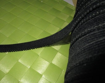 6 yards in 1/2" width black color elastic trim with 1 side scalloped design for your fashion design or mask project elastic.