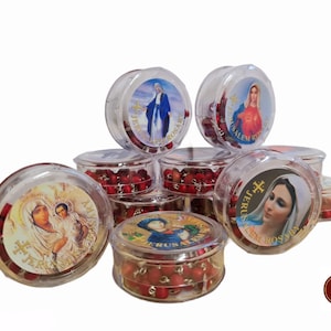 12 rosary with perfume from holy land Jerusalem 12 Rosary= 1 Dozen in the package each rosary with metal cross and jerusalem cross in middle