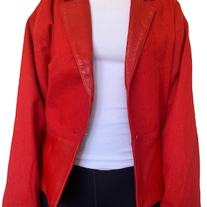 Vintage 1980’s red leather and wool peplum blazer. Size 8 AU.