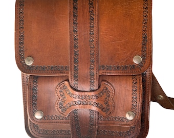 Beautiful vintage 1970’s hand tooled leather bag.