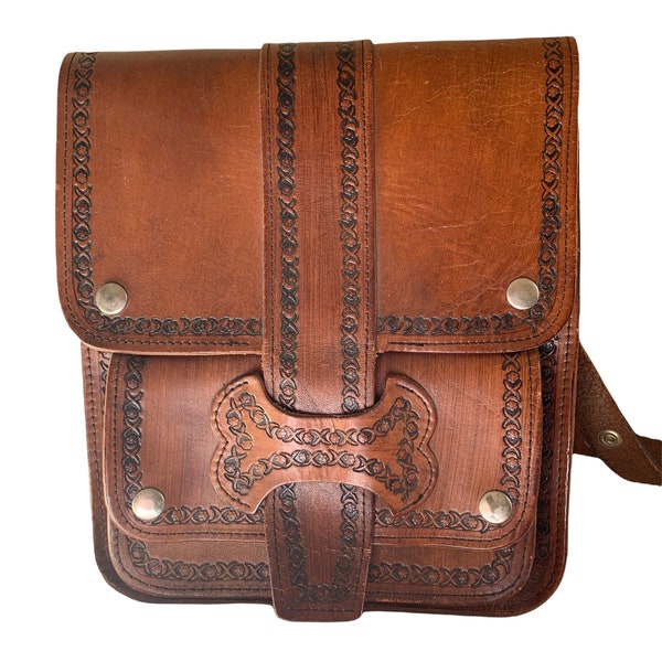 Beautiful vintage 1970’s hand tooled leather bag.