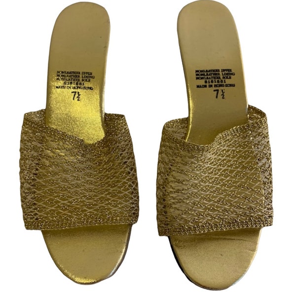 Vintage 90’s does 60’s style gold slip on mules. Size 7.5/8.