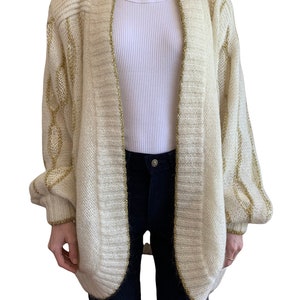 Vintage 1980’s slouchy oversize cream and gold mohair cardigan. Size medium.