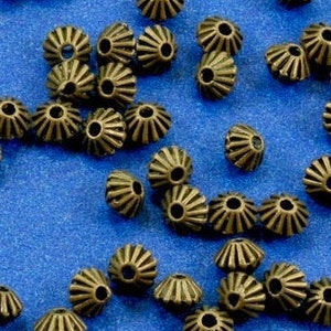 50 pcs -Antique Bronze Bicone Spacer Beads, Stripe Pattern Bicone Beads, Stripes Carved, 5mm x 4mm, Hole:Approx 1mm- AB-B14482