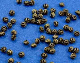 50 pcs -Antique Bronze Bicone Spacer Beads, Stripe Pattern Bicone Beads, Stripes Carved, 5mm x 4mm, Hole:Approx 1mm- AB-B14482