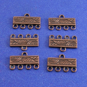 May include: Six copper-toned metal connector pieces with a wavy design and four loops each. The connectors are for jewelry making.