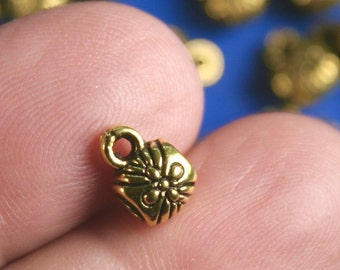 25 pieces -Antique Gold Bail Beads, Gold Tone Barrel Beads, Flower Pattern, 9mm x 6mm, Hole size: 2.7mm- MetBd-B0099740