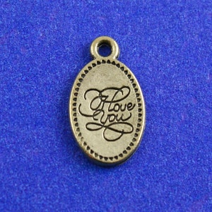 10 peças - etiqueta 'Eu te amo' de bronze antigo, pingente de amor minúsculo, etiqueta oval de latão antigo, 18 mm (3/4 ") x 10 mm (3/8"), AG-B61904