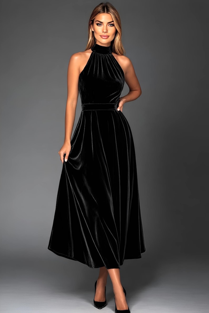 black velvet halter midi dress with pockets, sleeveless design with halter neckline a line style