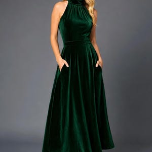emerald velvet halter midi dress with pockets, sleeveless design with halter neckline a line style