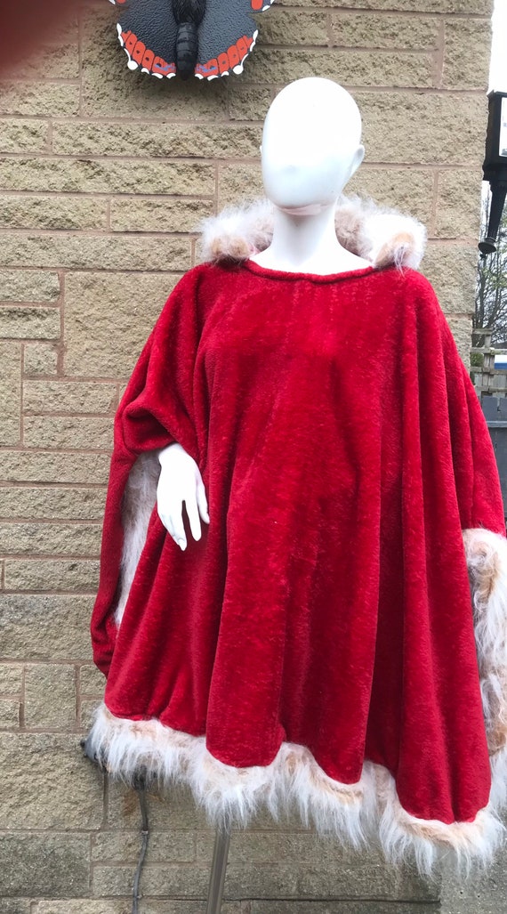 red poncho with fur