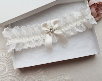 Ivory bow wedding garter, ivory bridal garter with a crystal, ivory garter for wedding