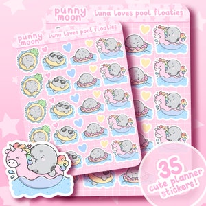 May include: A sheet of 35 cute planner stickers featuring a gray moon character riding a pink unicorn pool float. The stickers are on a pink background with a grid pattern. The text "punny moon" and "Luna Loves pool floaties" is on the sheet.