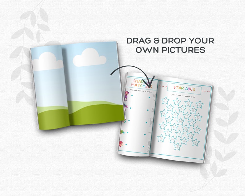 May include: An open book with two pages showing a children's activity book. The left page has a picture of a blue sky with white clouds and green hills. The right page has two activities: "Shadow Matching" and "Star ABCs". The text "DRAG & DROP YOUR OWN PICTURES" is at the top of the page.