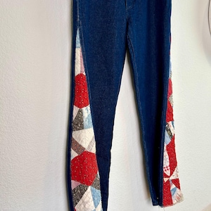 The Yellowstone size 12 Wrangler Flare Jeans with Vintage Quilt Panels