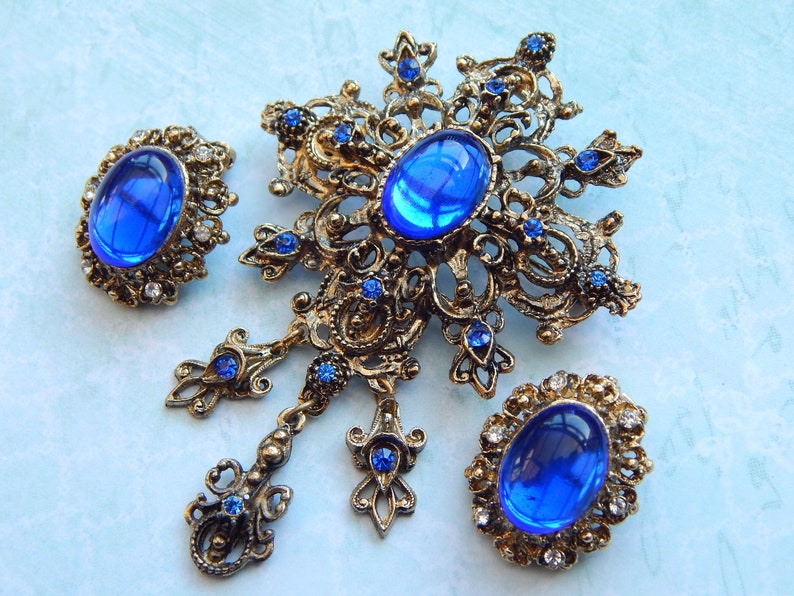electric blue fleur de lis style brooch and clip on earrings set