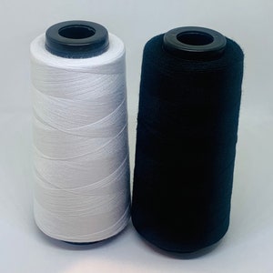 White Thread. Black Thread. Sew All Polyester Thread Spool. White 100% Polyester Thread. 1749 Yards