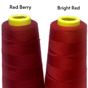 May include: Two spools of red thread, one labeled "Red Berry" and the other labeled "Bright Red".